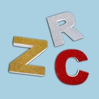 Letras de corcho con acabado en purpurina de color oro